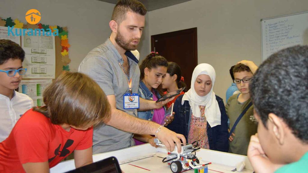 في إطار دعمها للتميز الأكاديمي والتمكين التكنولوجي، نظّمت منظمة كرماء دورة تدريبية متخصصة في مجال الروبوتات لخمسة طلاب أيتام متفوقين من العام الدراسي 2018. تأتي هذه المبادرة ضمن برنامج رعاية وتأهيل الأرامل والأيتام، الذي يسعى إلى تمكين الفئات المتضررة من الحرب والنزوح، عبر التعليم النوعي والتدريب العملي الذي يُنير طريقهم نحو مستقبل أفضل. أهداف دورة الروبوت: أكثر من تدريب تقني تنمية المهارات التقنية لدى الطلاب الأيتام كانت الغاية الأساسية من هذه الدورة، حيث صُممت لتعزيز قدرات المشاركين في مجالات البرمجة، الإلكترونيات، وتصميم الروبوتات. هذه المهارات لا تُعزز فقط قدراتهم التقنية، بل تبني فيهم روح الإبداع والابتكار، وتُحفزهم ليكونوا روادًا في مجالات STEM (العلوم، التكنولوجيا، الهندسة، الرياضيات). كما تسعى منظمة كرماء من خلال هذا النشاط إلى: تحفيز الطلاب المتفوقين على متابعة شغفهم العلمي. تعزيز الثقة بالنفس من خلال العمل الجماعي وحل المشكلات. فتح آفاق علمية جديدة للأطفال المتضررين، وتمكينهم ليكونوا جزءًا من الثورة التكنولوجية العالمية. محتوى الدورة: رحلة علمية ممتعة بدأت الدورة بأساسيات البرمجة باستخدام منصات تعليمية مخصصة للأطفال، ثم انتقل الطلاب إلى تصميم الروبوتات وتجميع أجزائها باستخدام أدوات تفاعلية مثل LEGO Mindstorms وArduino. تضمن البرنامج: ورش عمل تفاعلية في التفكير المنطقي وهندسة الروبوت. تطبيقات عملية جماعية لصناعة روبوتات تؤدي مهام حقيقية. أنشطة تحفيزية لبناء مهارات التعاون والعمل ضمن فرق. كل ذلك تم تحت إشراف مدربين مختصين، مع تهيئة بيئة آمنة ومشجعة على التعلم والابتكار، تعكس أهداف منظمة كرماء في تقديم تجربة تعليمية متكاملة. لماذا تستثمر كرماء في تعليم الروبوت للأطفال الأيتام؟ تؤمن منظمة كرماء بأن العلم والتقنية هما مفتاح التمكين الحقيقي للأطفال المتضررين، وخاصة الأيتام الذين حُرموا من بيئة مستقرة. من خلال هذه المبادرة، ترسّخ كرماء رسالتها الإنسانية في: تحويل المعاناة إلى إنتاج عبر برامج نوعية تعليمية. تمكين الأيتام ليكونوا بناة المستقبل، لا ضحاياه. رعاية الأذكياء والمتفوقين ومساعدتهم على الوصول لأقصى إمكانياتهم. مثل هذه الدورات لا تكتفي بتعليم مهارات تقنية فقط، بل تُعيد بناء الثقة في الأطفال، وتُشعرهم أنهم قادرون على الإنجاز والتغيير، تمامًا كأقرانهم في المجتمعات المستقرة. دعوة للدعم: ساعد في صناعة عالم أفضل منظمة كرماء لا تملك عصا سحرية، لكنها تملك الإصرار والرؤية لصناعة التغيير، عبر العلم والتدريب والدعم النفسي. وبرنامج رعاية وتأهيل الأرامل والأيتام هو تجسيد عملي لهذا الطموح. كل دورة تدريبية، كل كتاب، كل ورشة، هي نتيجة دعم كريم من متبرعين آمنوا بقدرة هؤلاء الأطفال على النهوض وبناء غد مشرق. كن أنت سببًا في صناعة مستقبل أفضل. بدعمك، نستطيع أن ننظم المزيد من الدورات، ونصل إلى مئات الأطفال الطموحين الذين ينتظرون الفرصة ليُظهروا قدراتهم. خاتمة: التعليم التقني سبيل الأيتام نحو التمكين دورة الروبوت التي نظمتها منظمة كرماء لخمسة طلاب أيتام متفوقين ليست مجرد نشاط تدريبي، بل خطوة حقيقية نحو تمكين جيل جديد من القادة والمبدعين. إن تعليم الروبوت وبرمجة الآلات للأطفال الأيتام هو استثمار طويل الأمد في بناء مجتمع سوري قوي قادر على النهوض من ركام الحرب. ادعم منظمة كرماء اليوم، وكن شريكًا في تمكين الأيتام وبناء مستقبلهم.